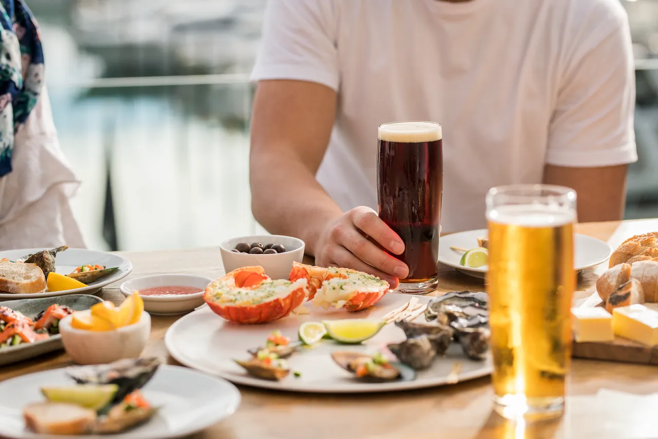Seafood appetizers with people