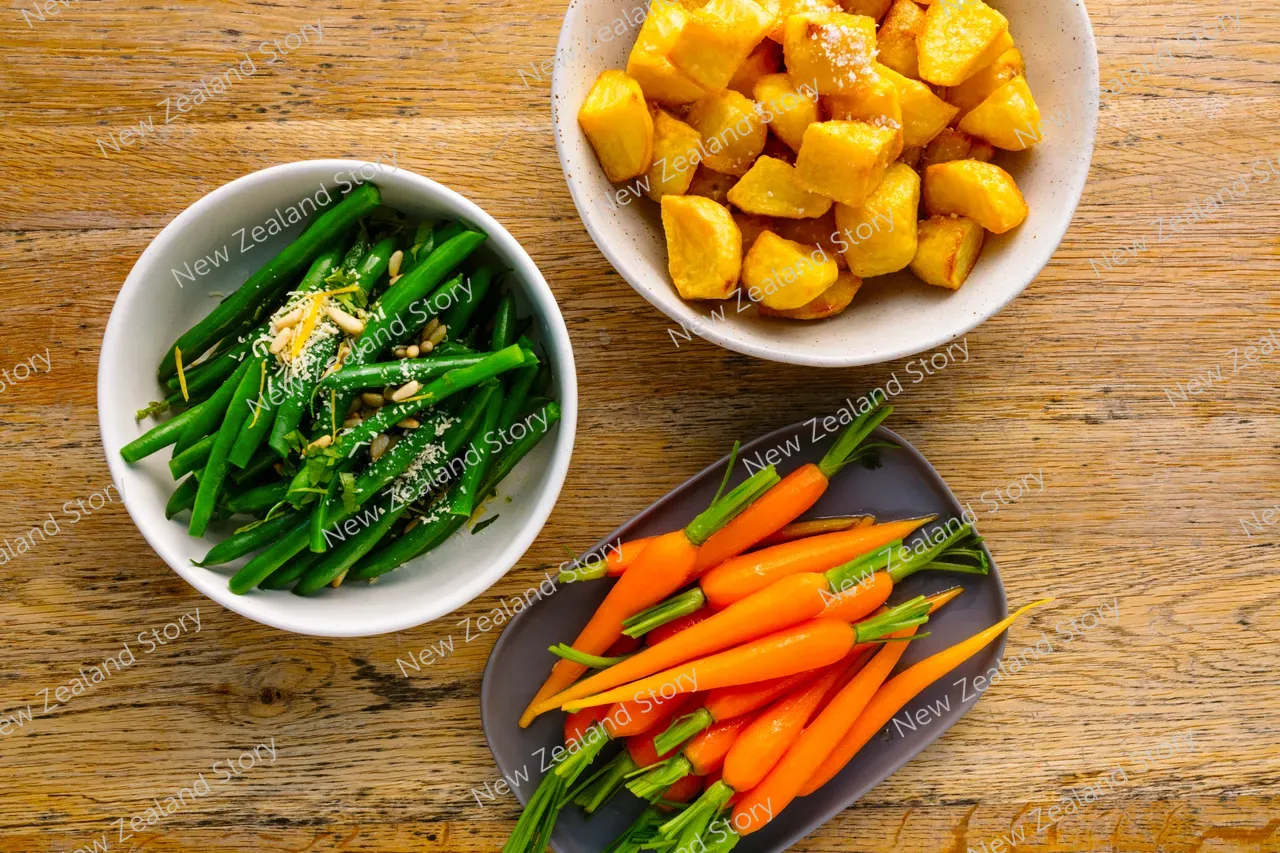 Roast potatoes, baby carrots and beans