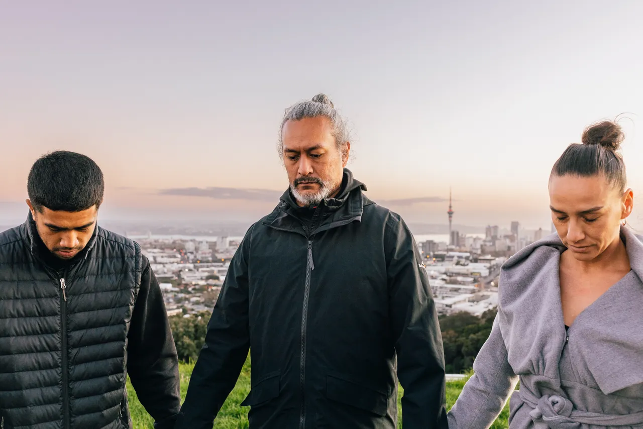 Blessing on Mount Eden with Sky Tower in background