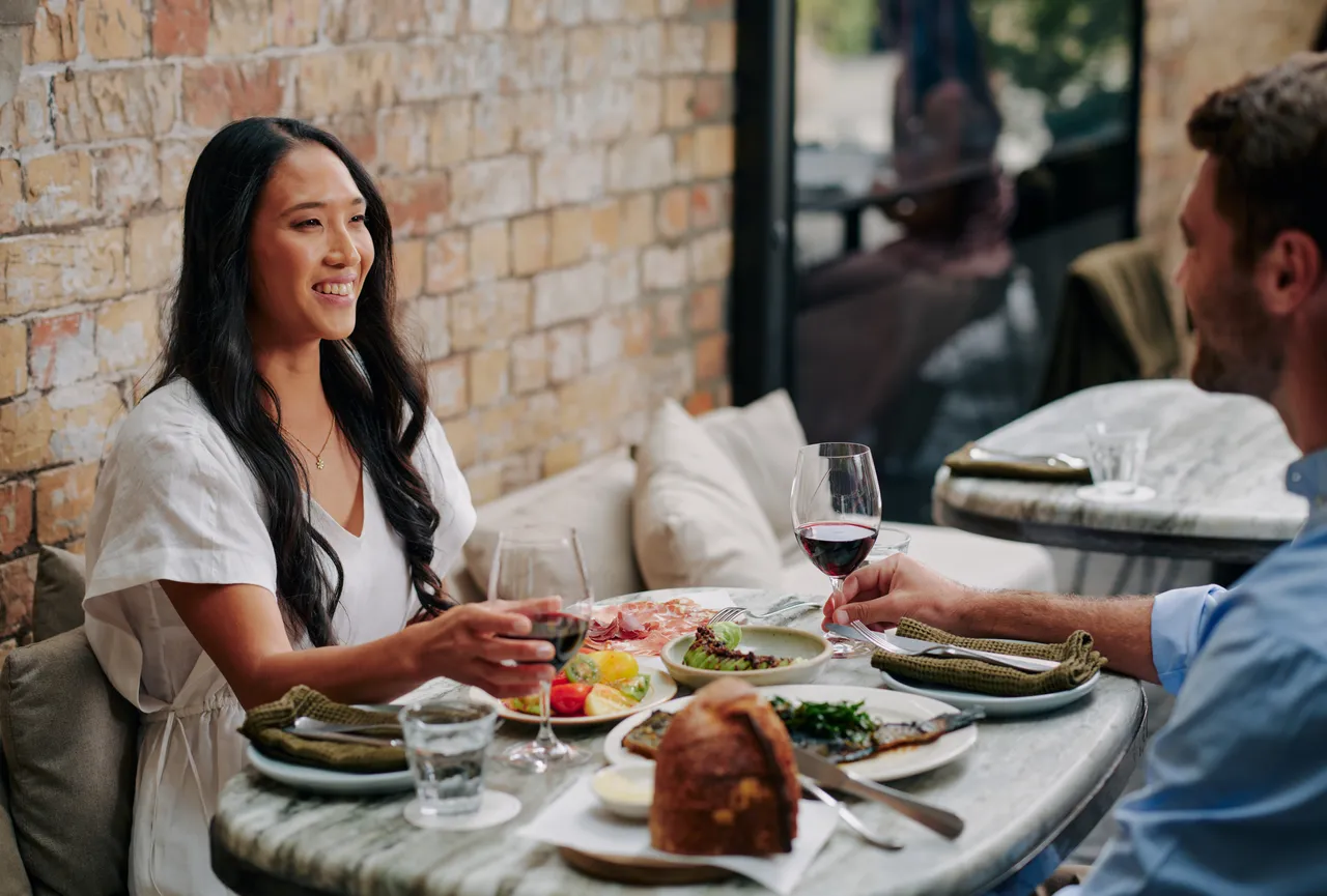 Couple enjoying lunch date at restaurant