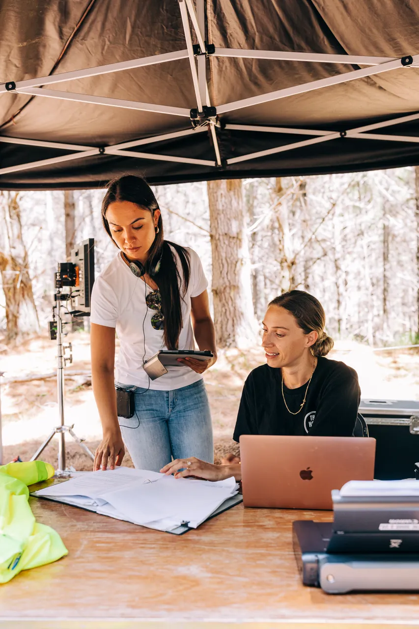 Producer and director having a production meeting on site