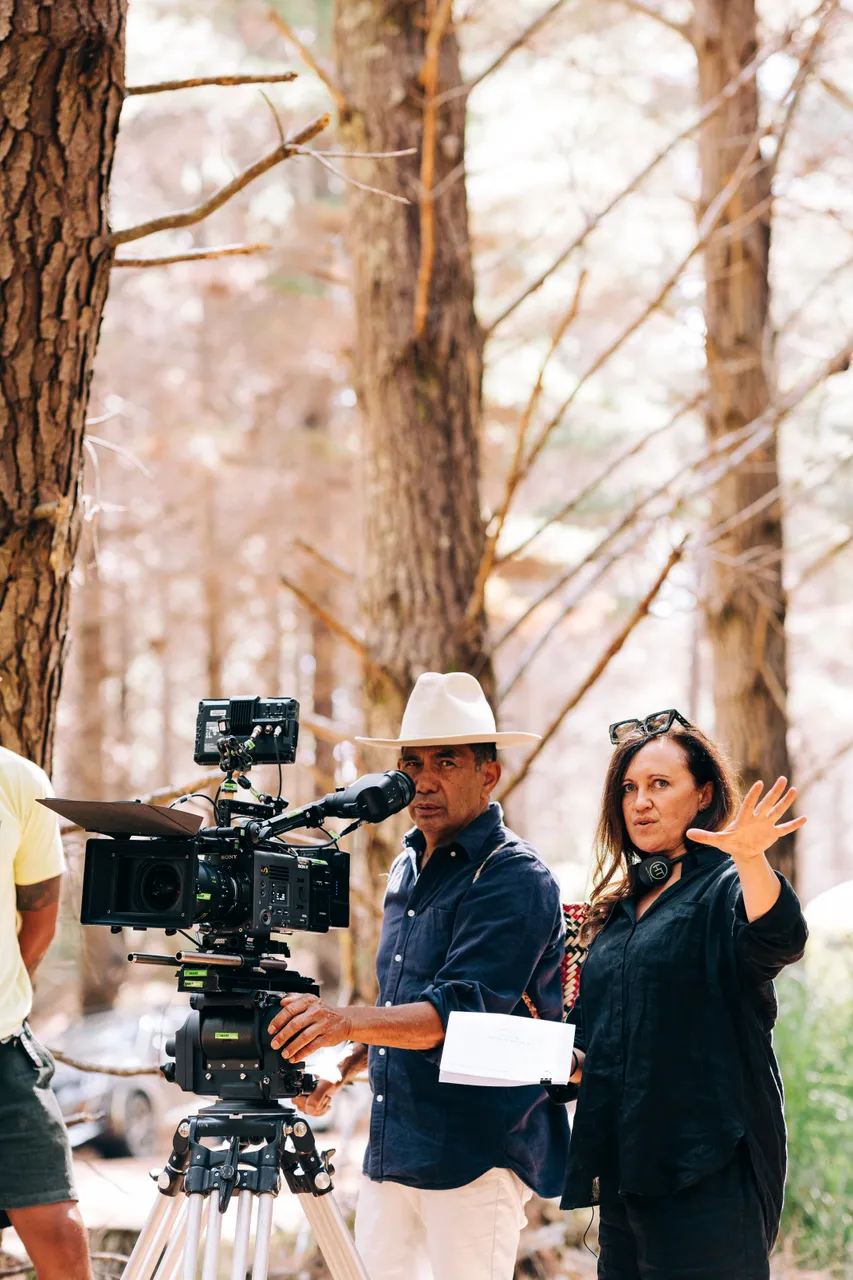 Behind the scenes look at film crew setting up shot