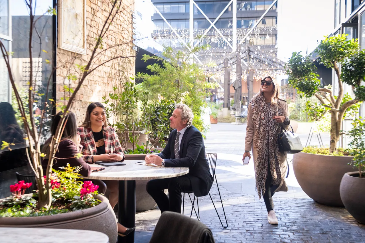 Delegates have meeting in courtyard