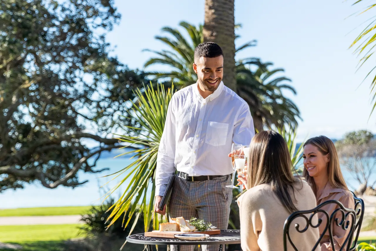Delegates enjoying a glass of champagne