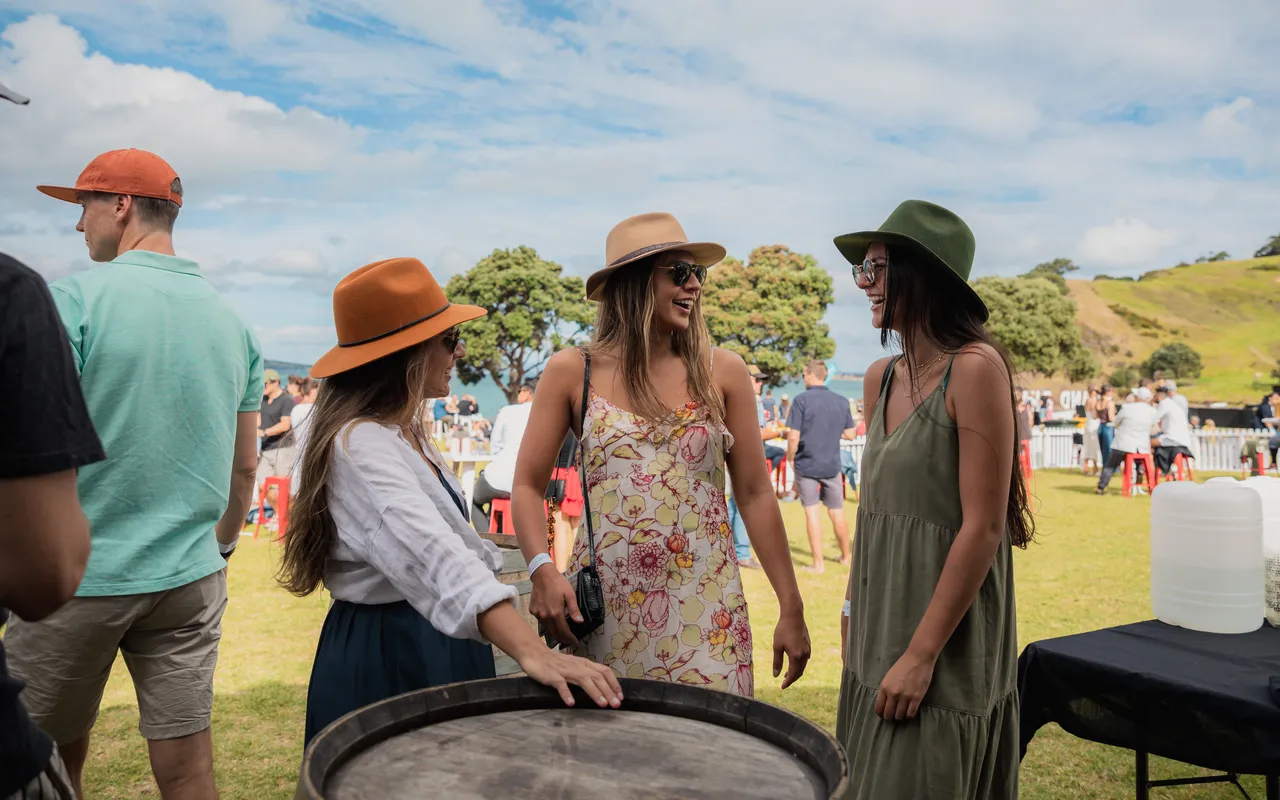 Three ladies laughing at festival