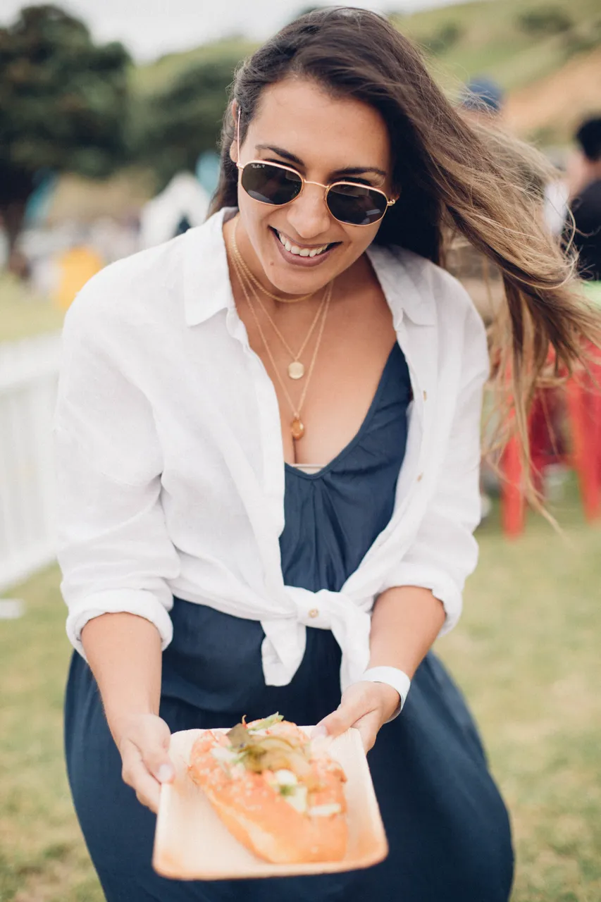Woman enjoying food at festival