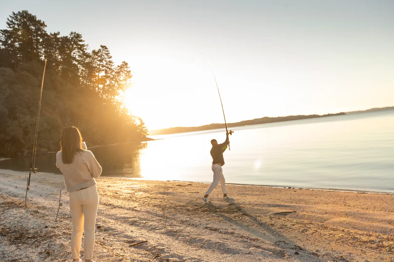 Man fishing on private beach