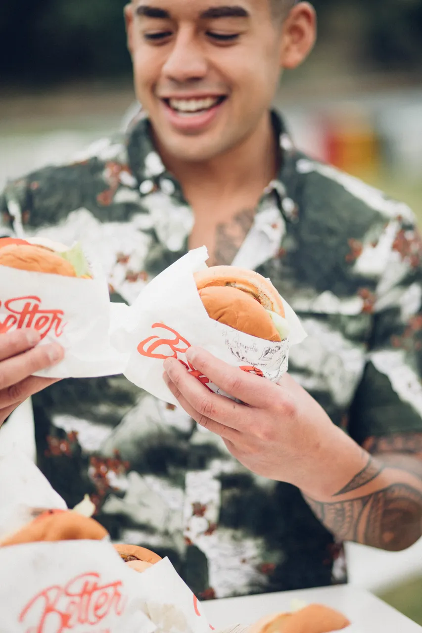 Festival-goer enjoying burgers
