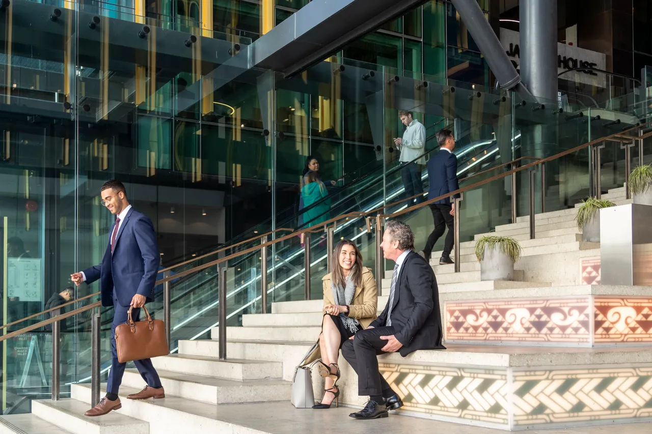 Delegates on stairs