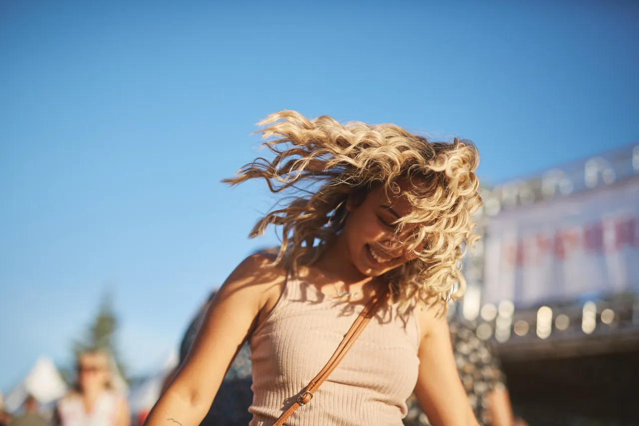 Woman smiling at festival