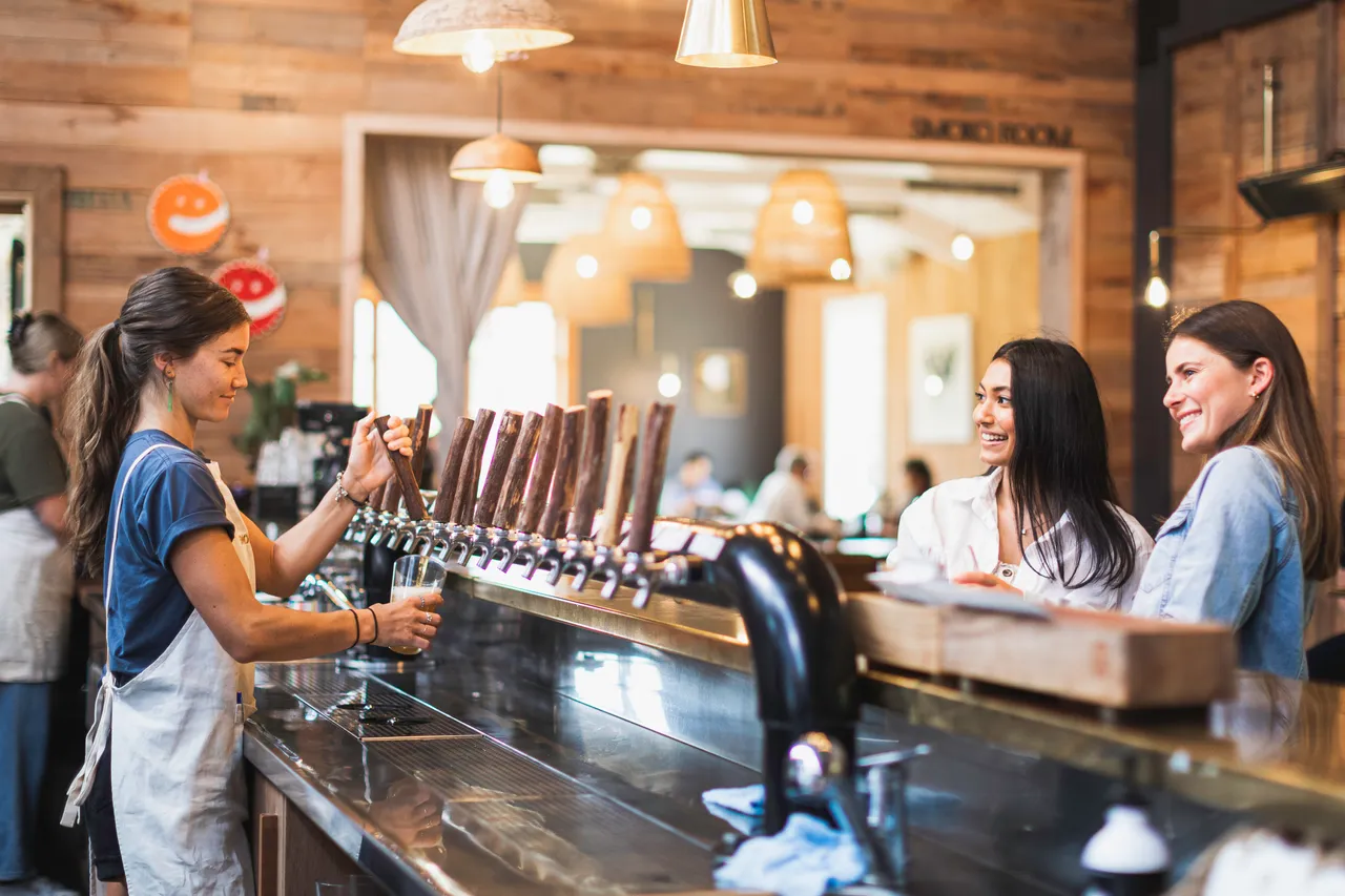 People at an Auckland brewery