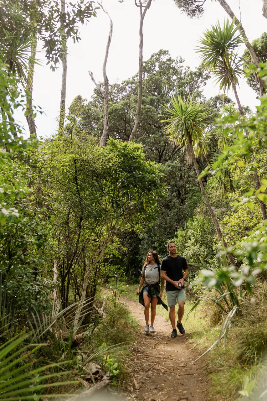 Woman and man walking in nature