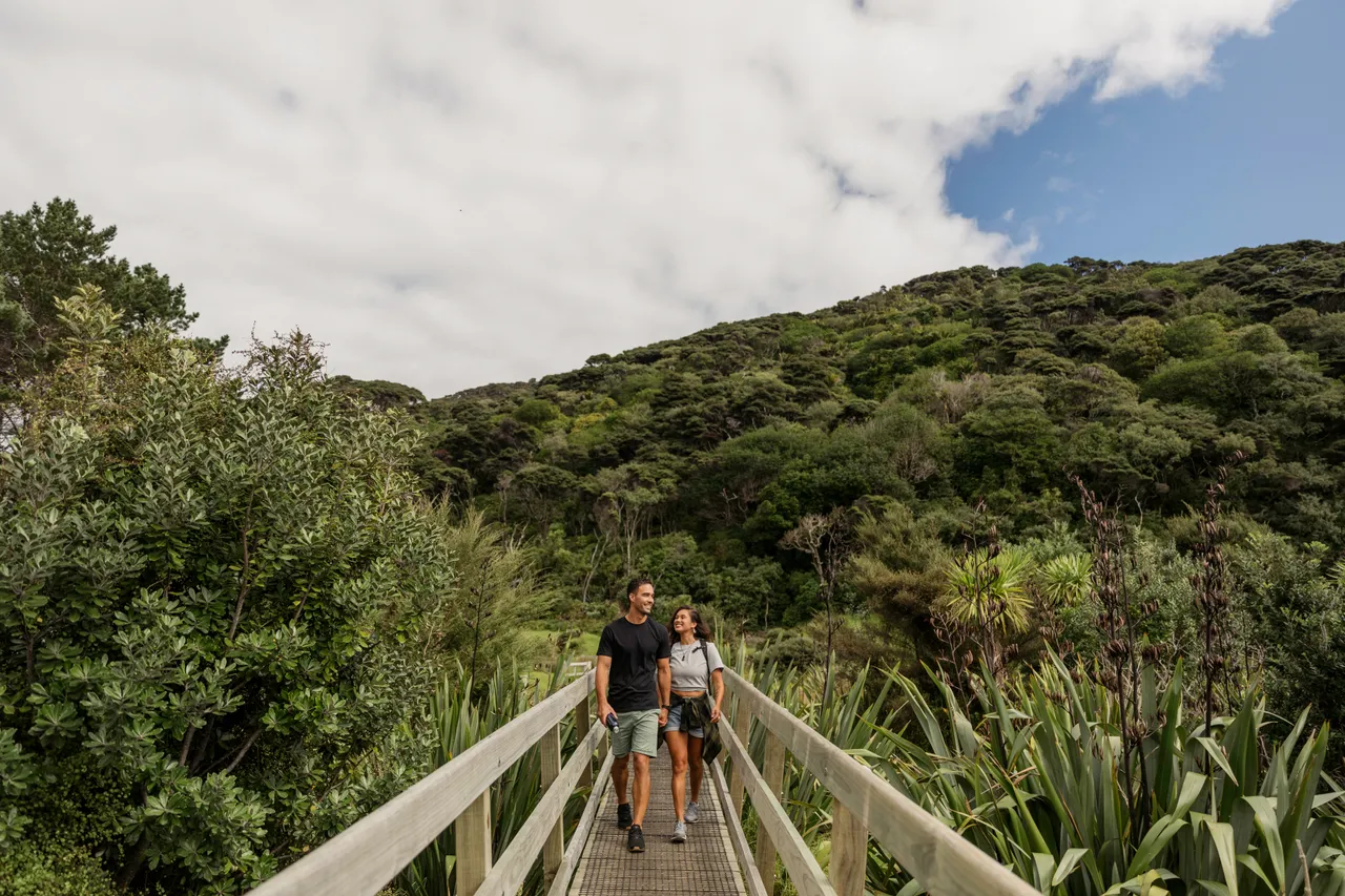 Man and woman on walking bridge