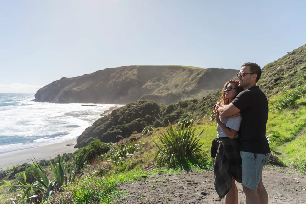 Couple enjoying view of the beach