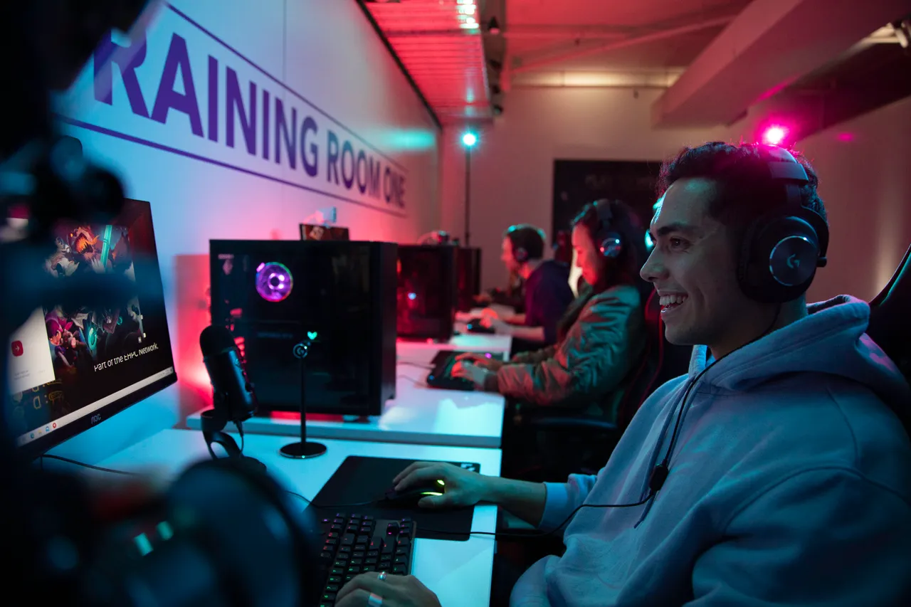 Young man playing games on computer