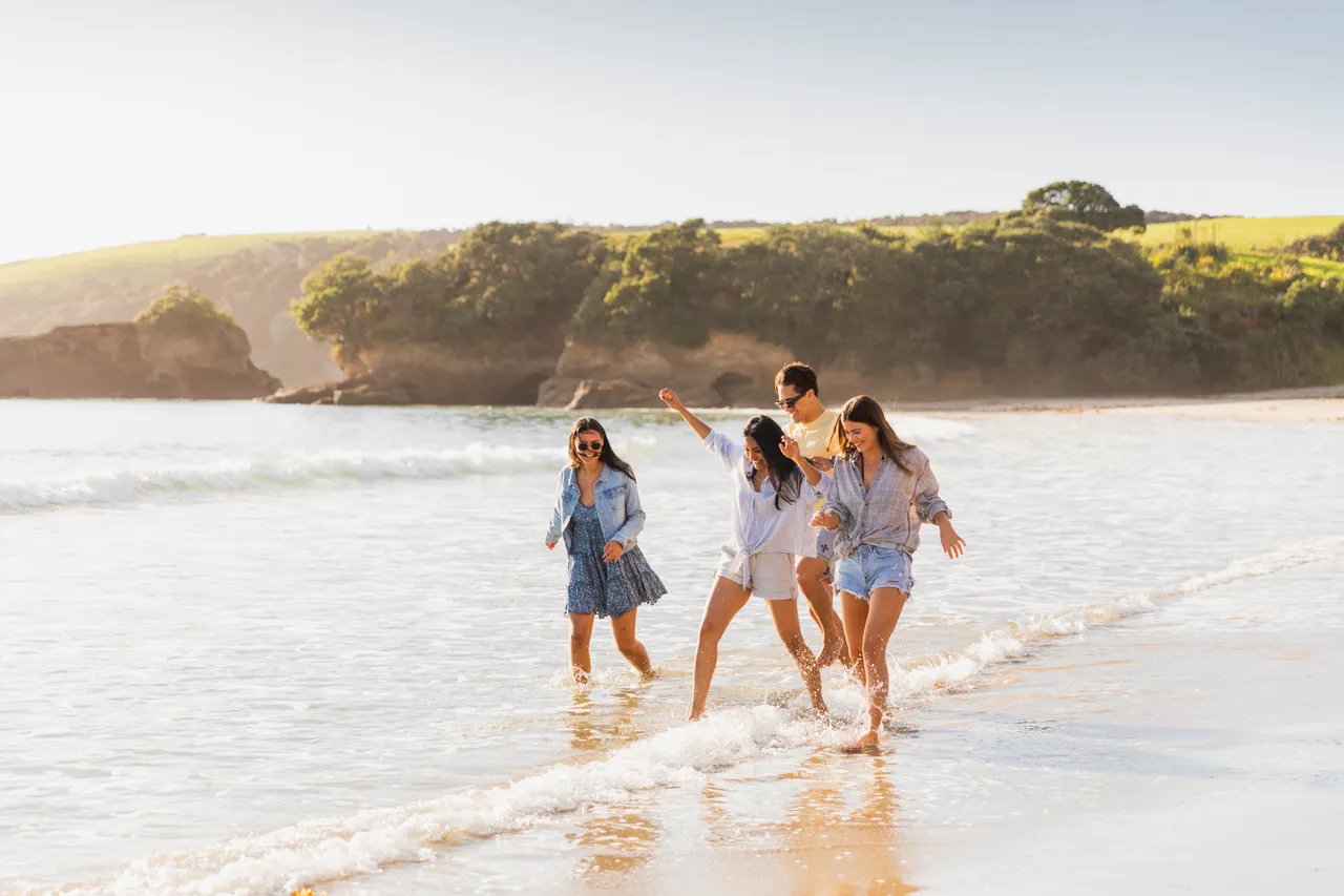 People walking in shallow water