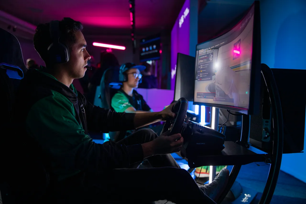 Two young men playing racing game