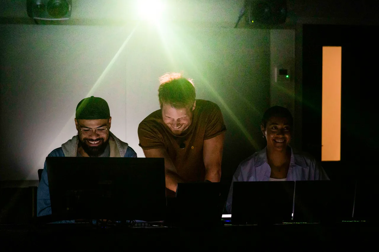 Group working in studio on computers
