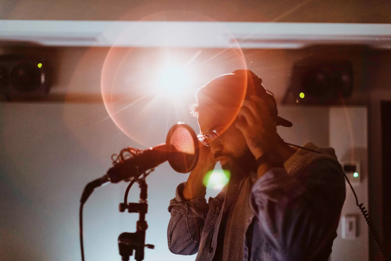 Man working in recording booth