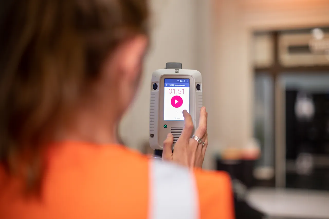 Woman setting up digital scanner