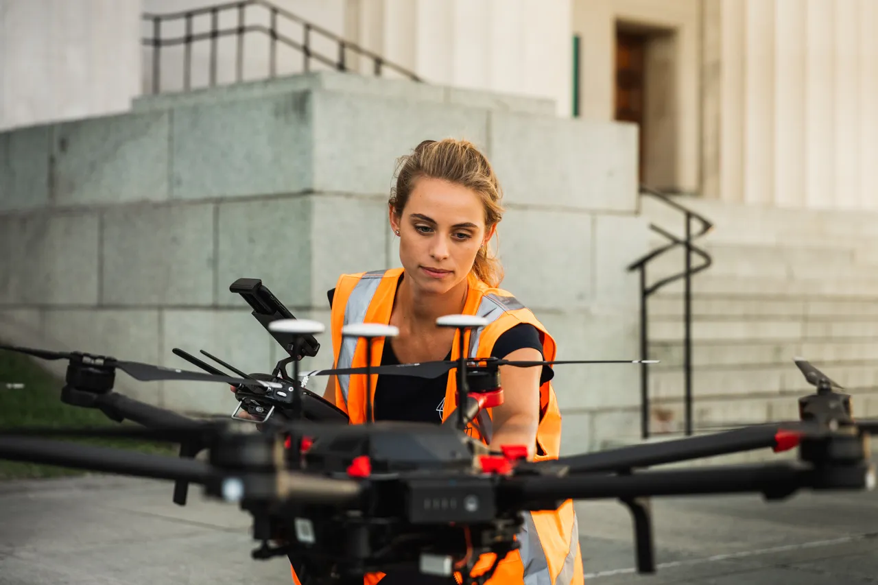 Woman flying drone