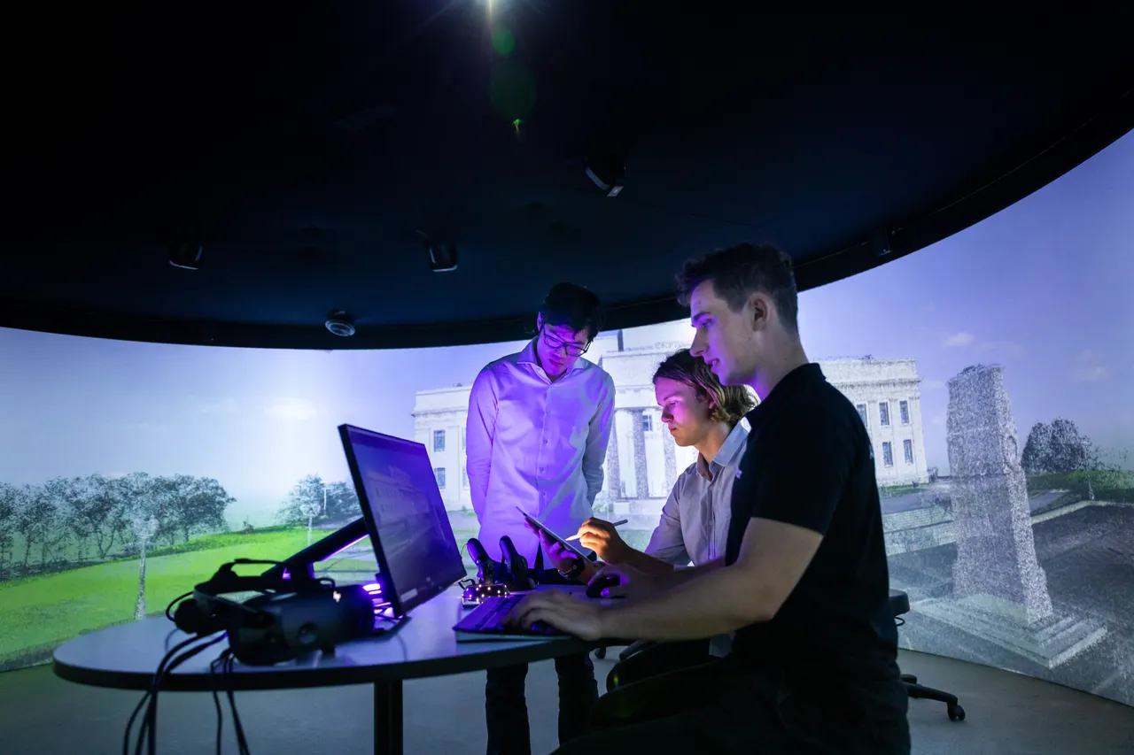 Men working on 3D project in immersion lab