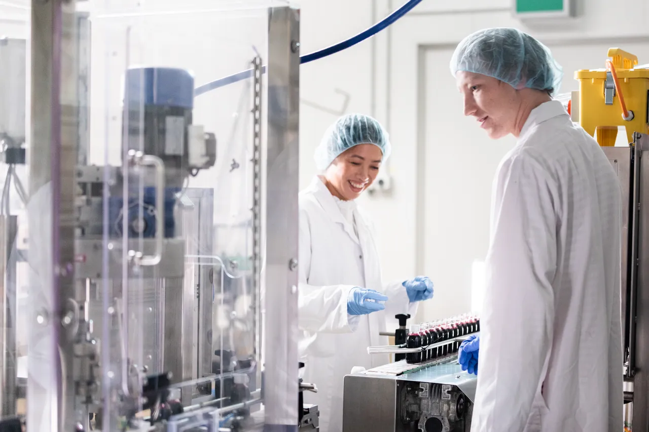 Woman and man working in laboratory