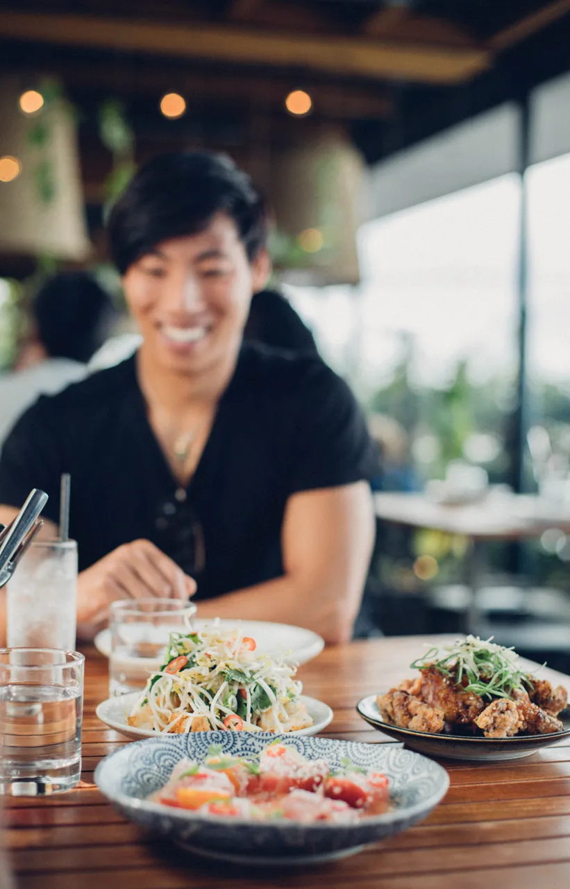 Man smiling at lunch