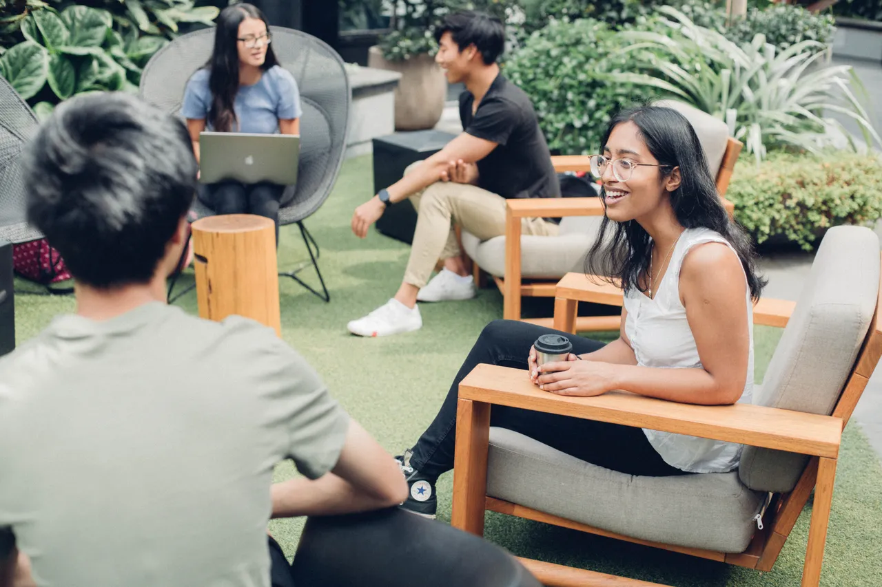 Group of students sitting and interacting