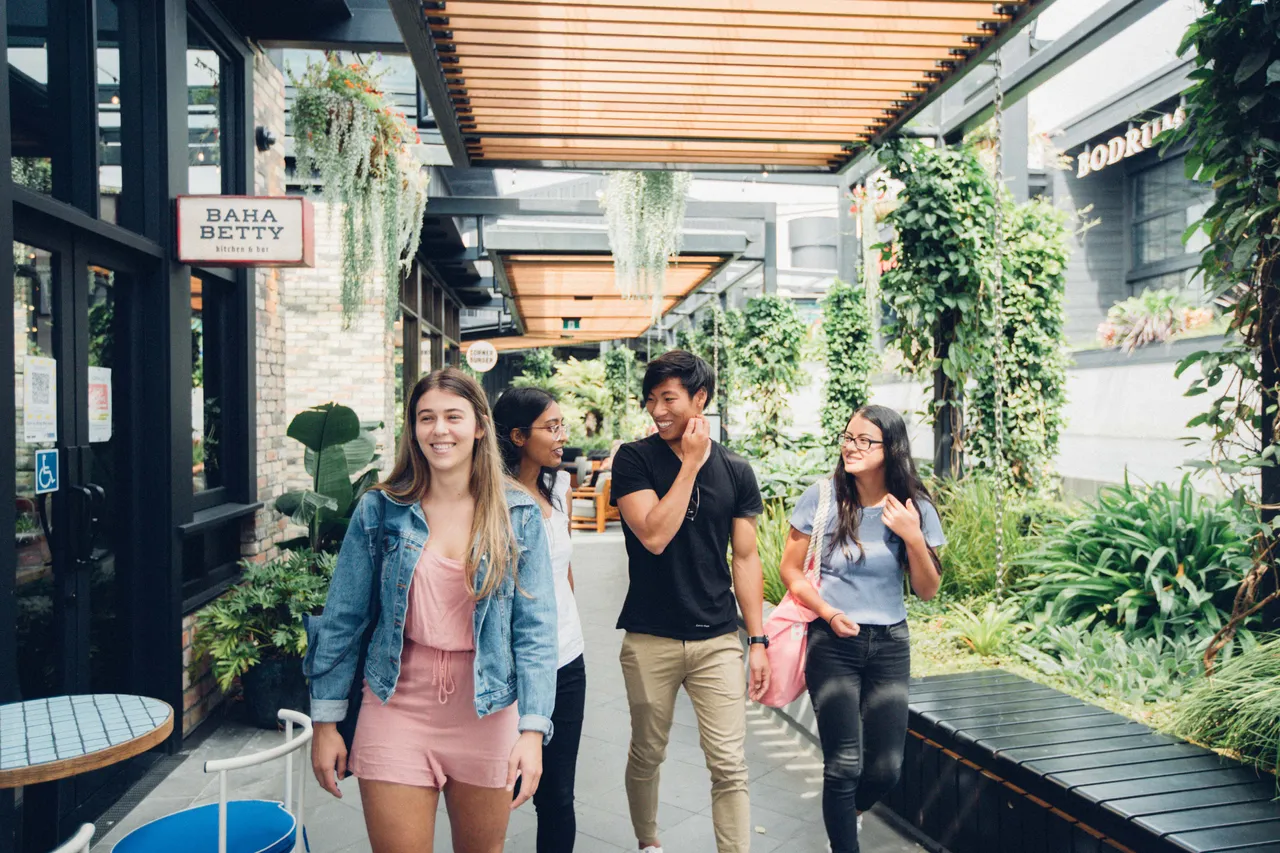 Group of people walking and interacting