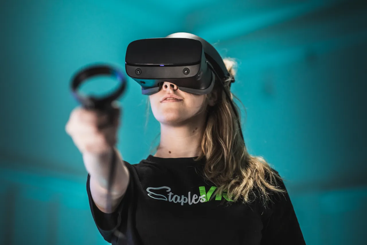 Woman using virtual reality equipment
