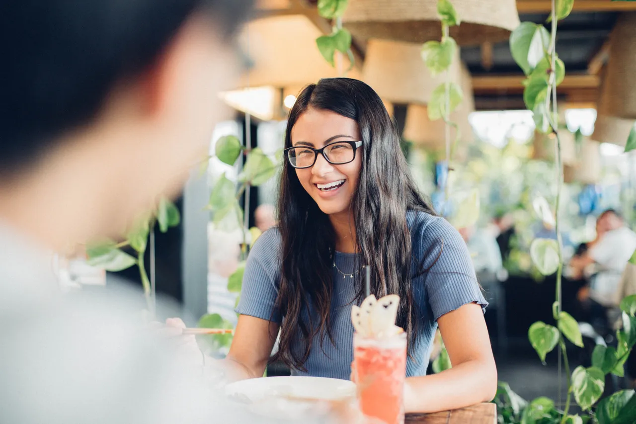 Girl smiling at lunch