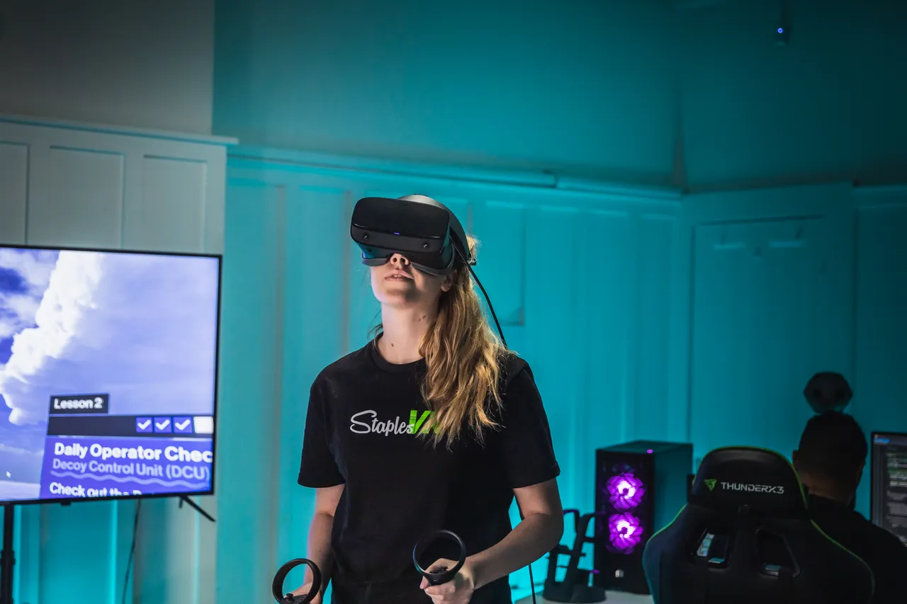 Woman wearing virtual reality headset in studio