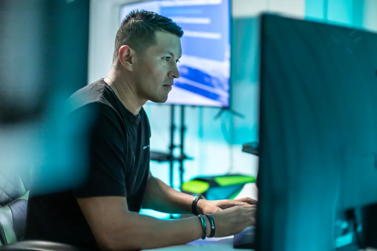 Man working on computer in vr studio
