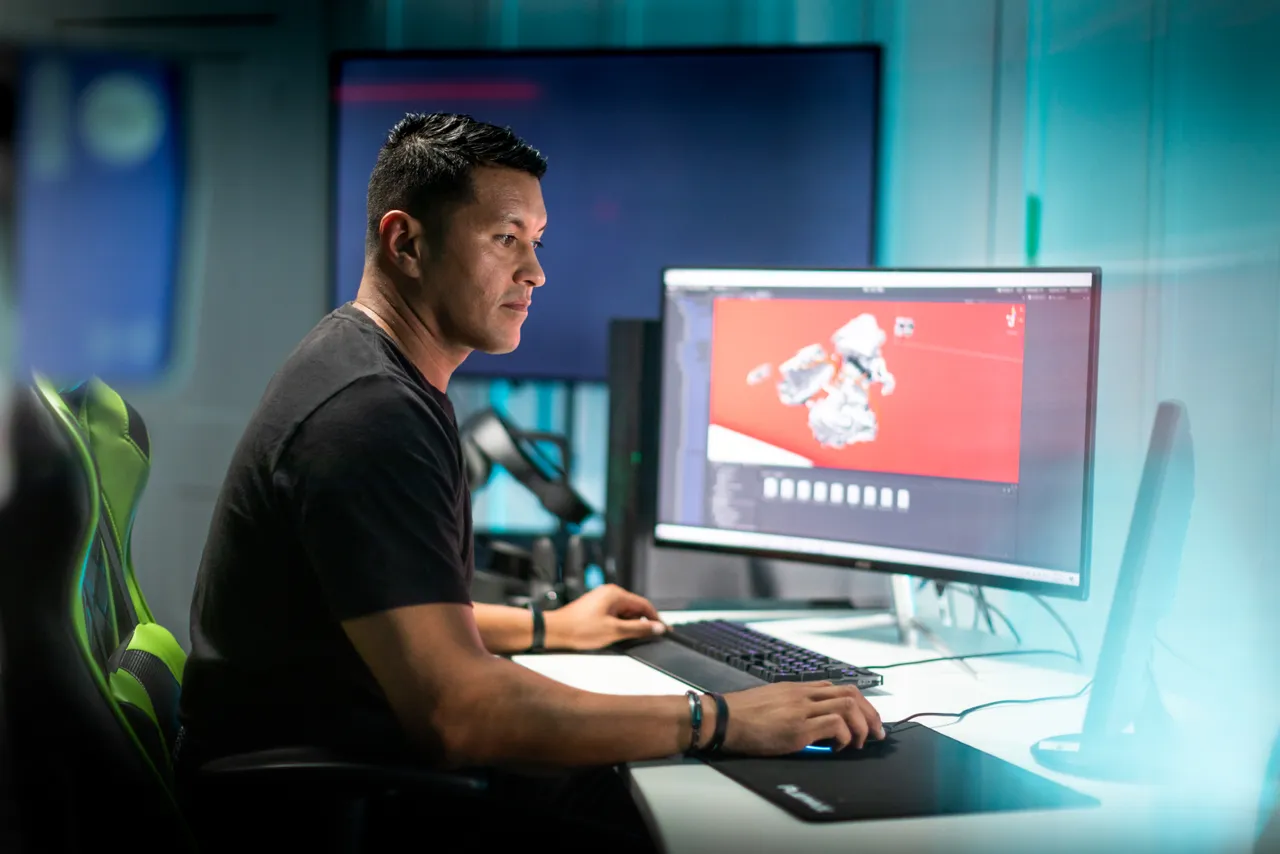 Man working on computer in studio