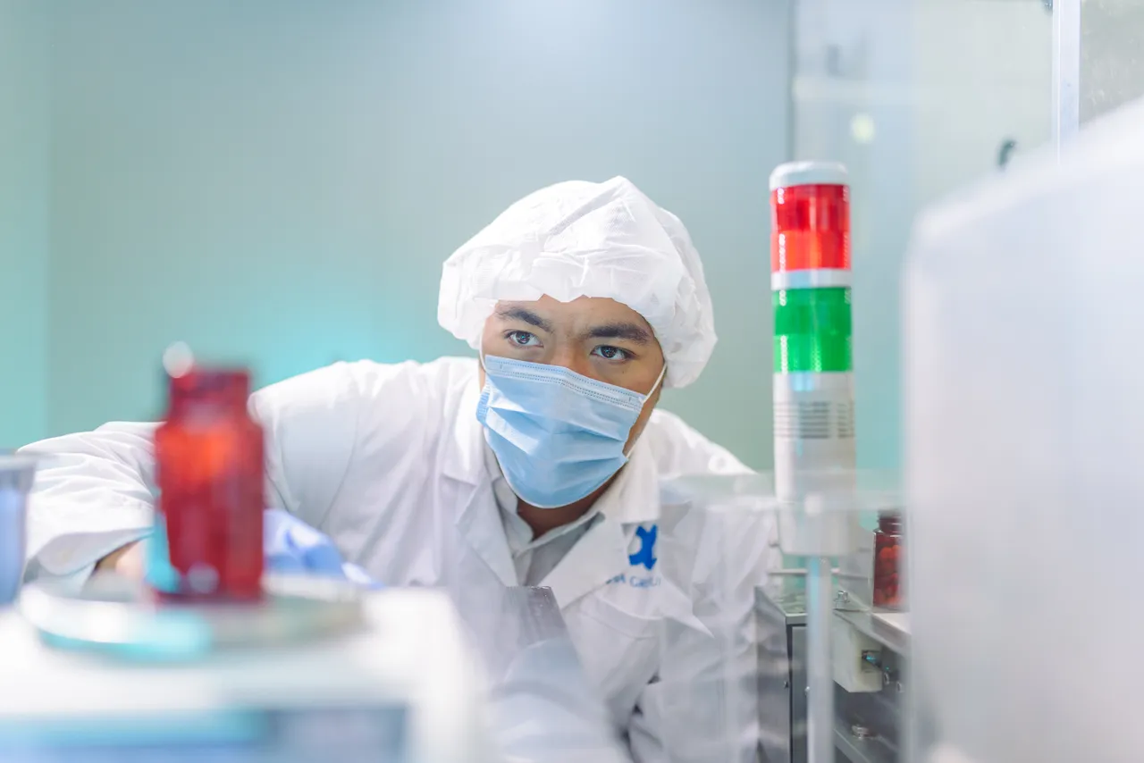 Man inspecting pharmaceutical product