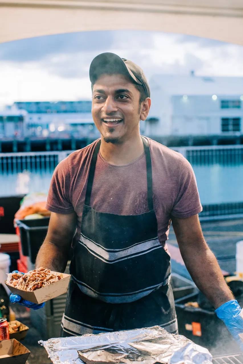 Warm dinner from a street vendor at a waterfront festival