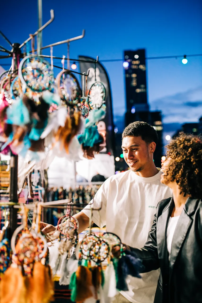 Couple shopping at an Auckland night market