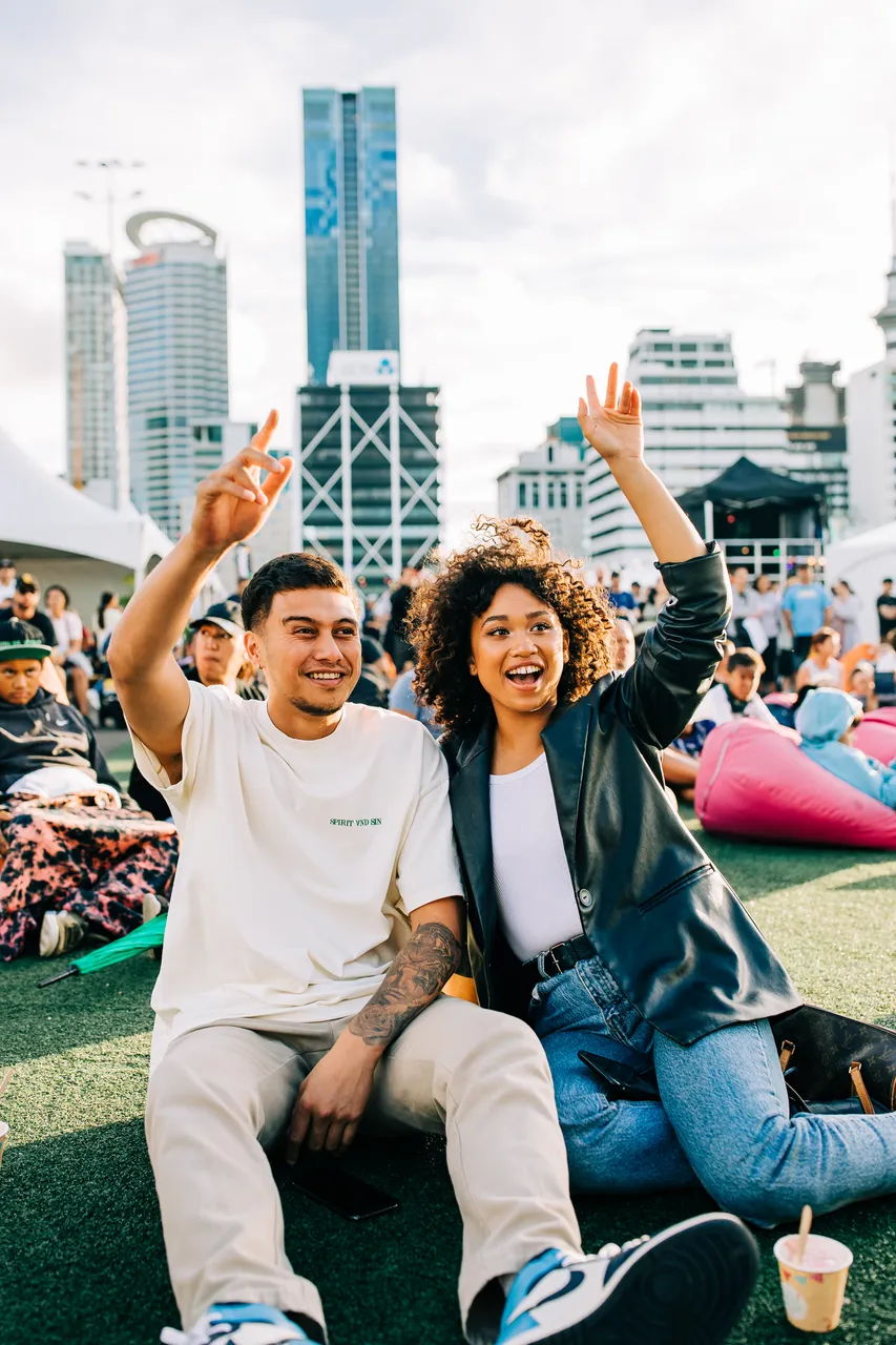 couple enjoying a show on Auckland waterfront