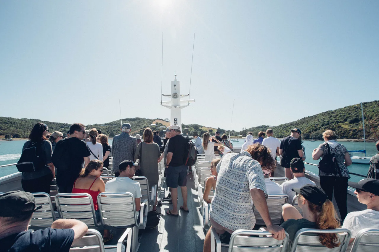 Groups of people travel by Ferry to Waiheke Island