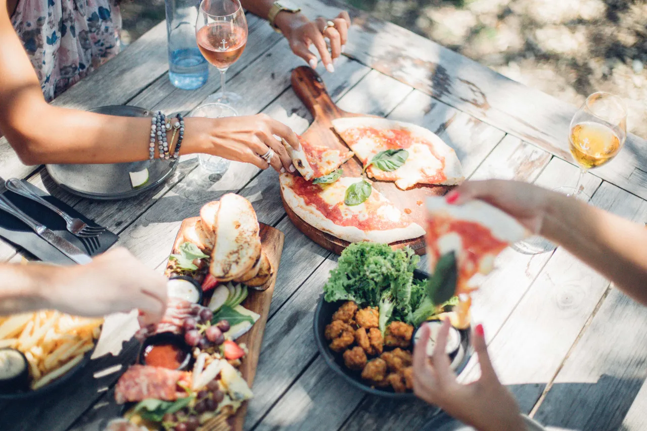 Friends enjoy wine and dining at Man O' War Vineyard