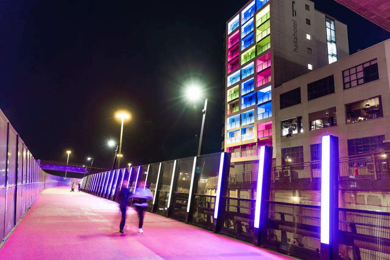 The Lightpath and the Haka Hotel lit up at night