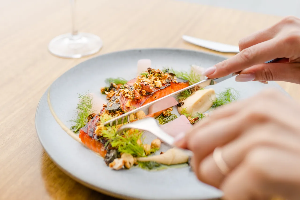 Tasting_fresh_seafood_dish_Auckland