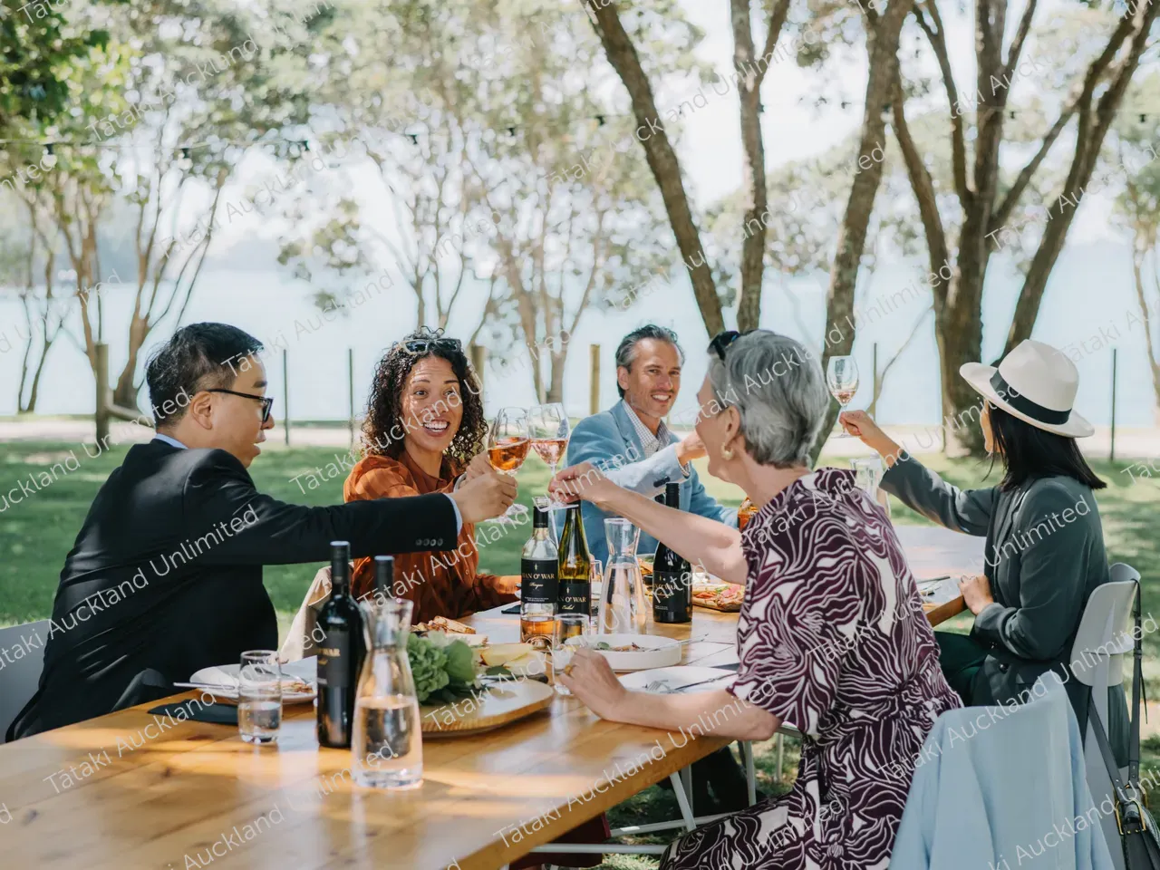 Business professionals dine outdoors at Waiheke vineyard 16