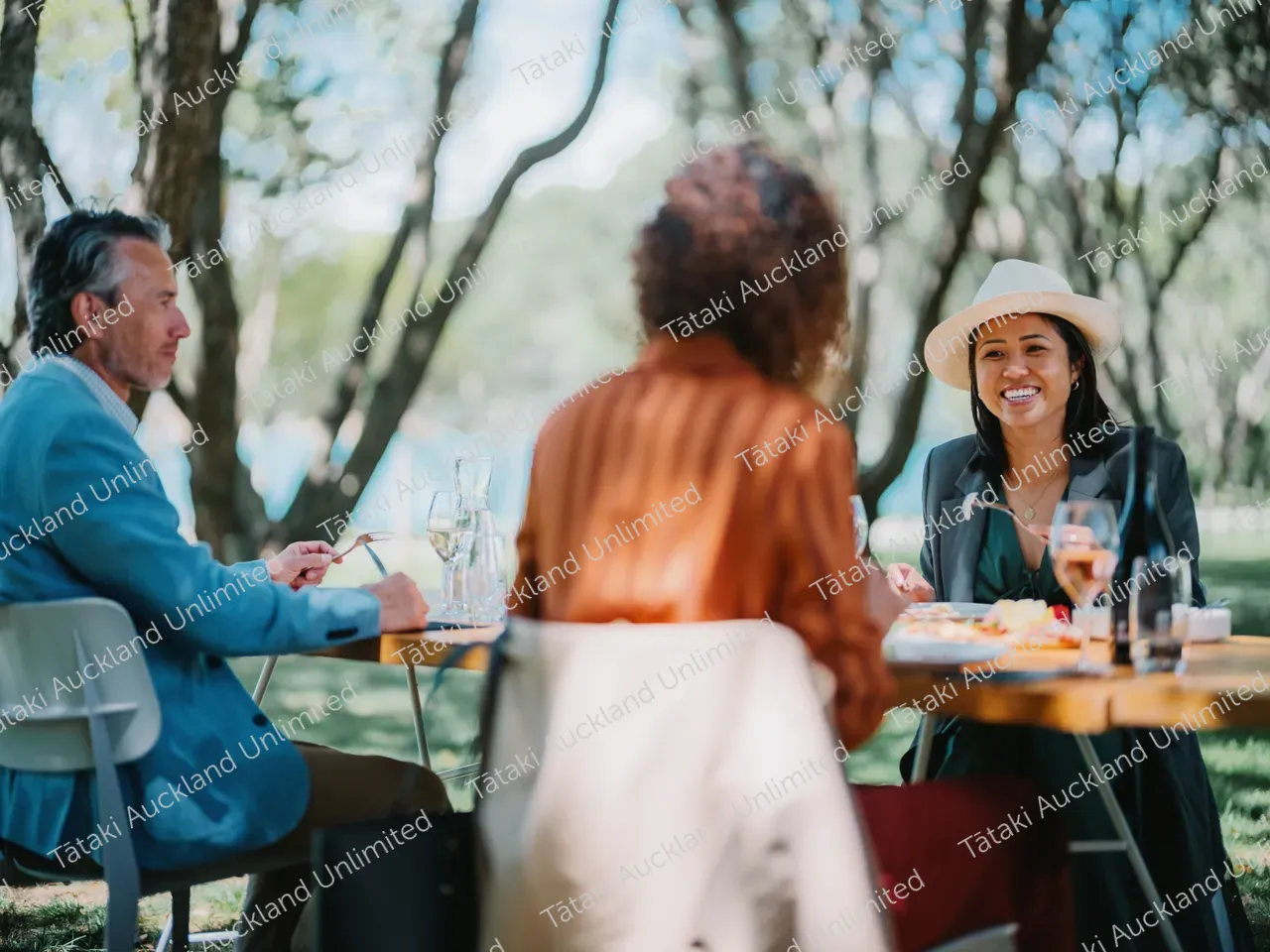 Business professionals dine outdoors at Waiheke vineyard 8