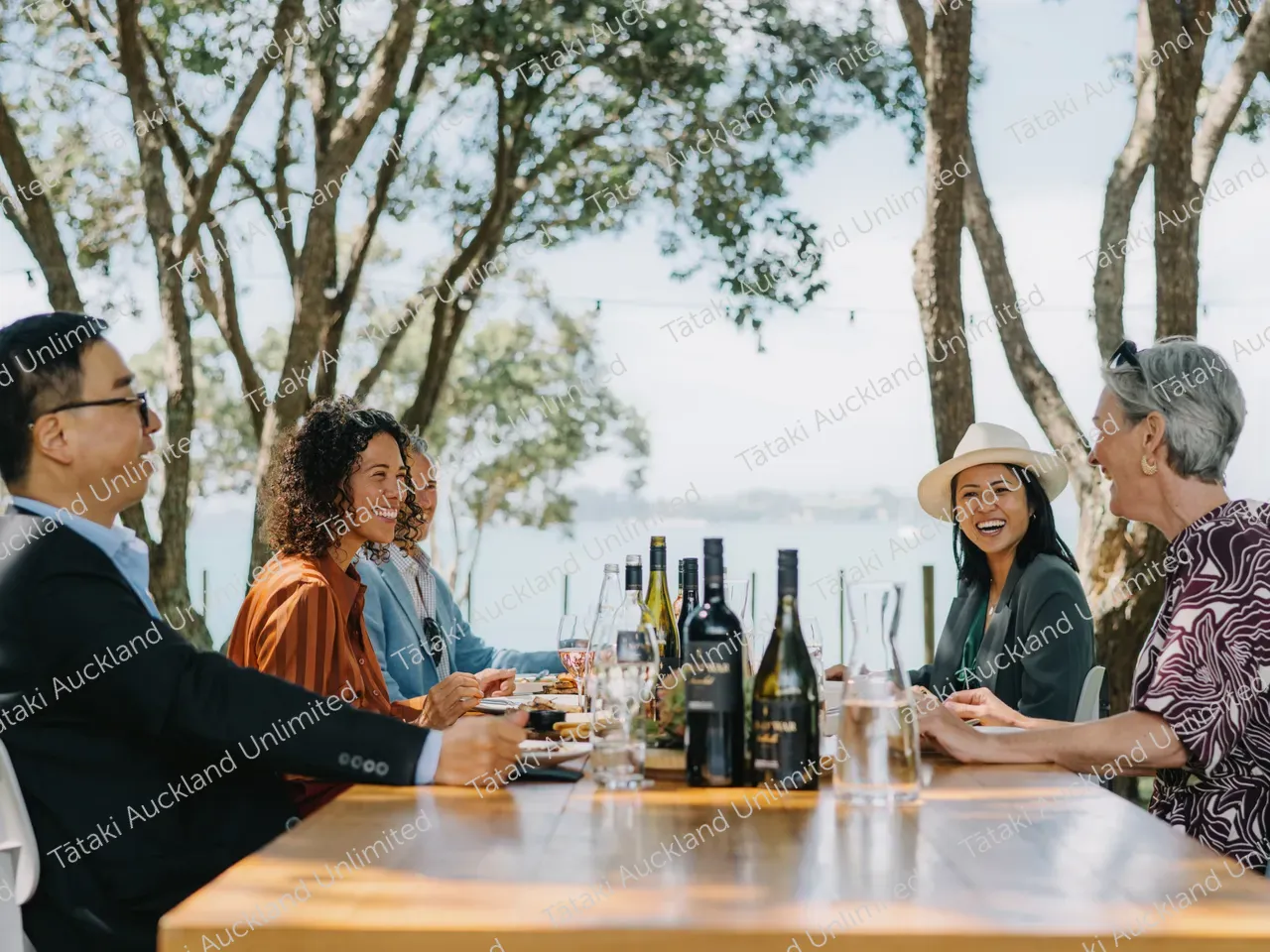 Business professionals dine outdoors at Waiheke vineyard 18