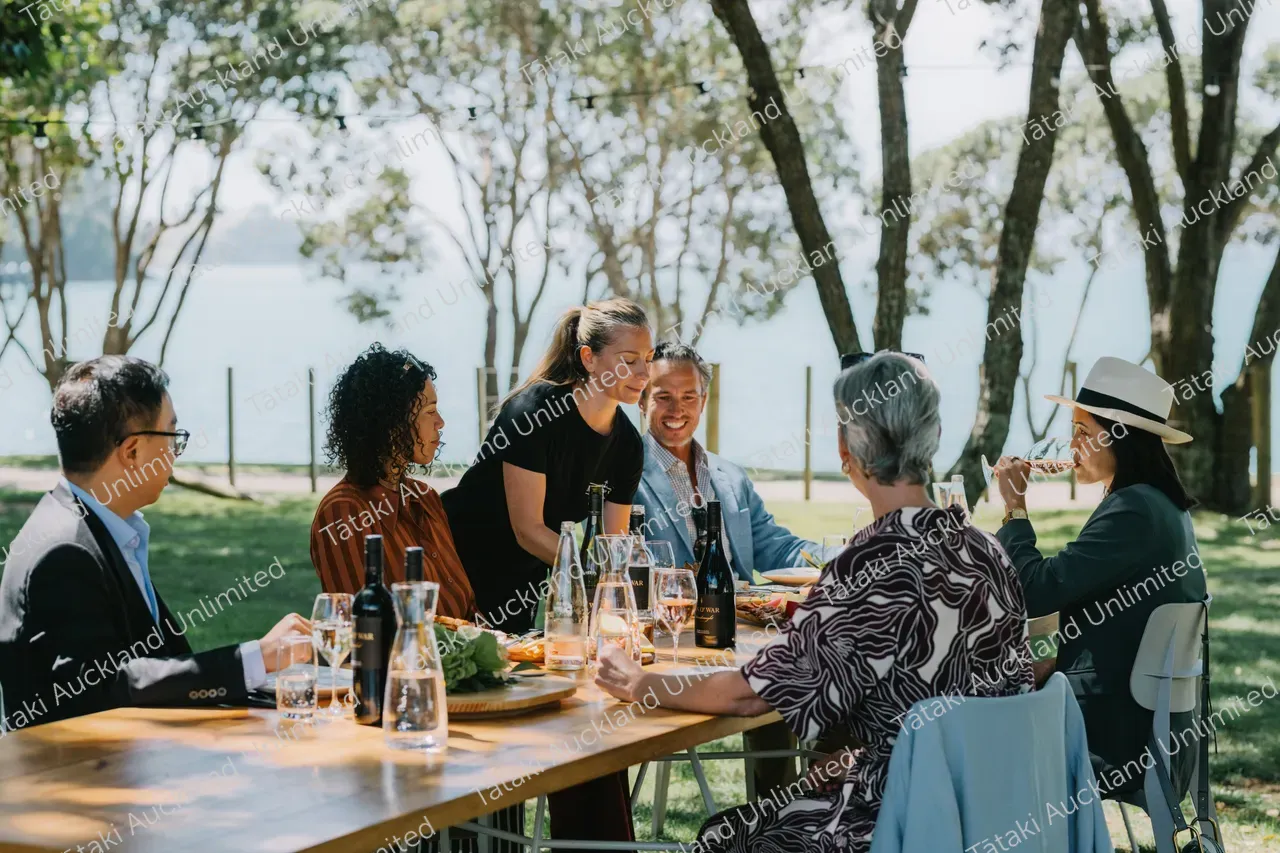 Business professionals dine outdoors at Waiheke vineyard 13