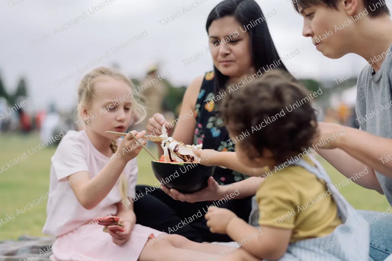 Family enjoys ice cream at Pasifika Festival 2