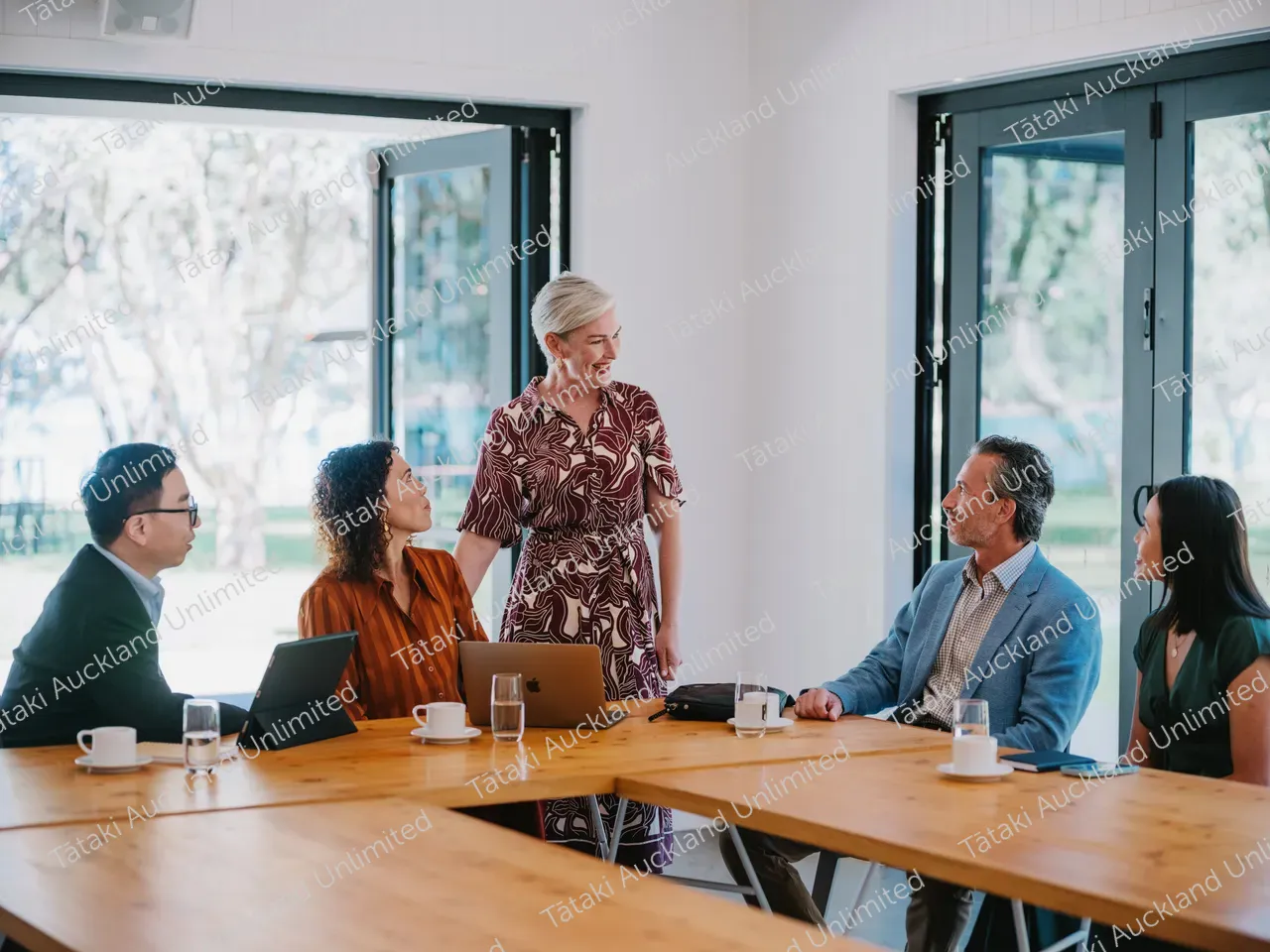 A group of business professionals having a meeting at a Waiheke conference venue