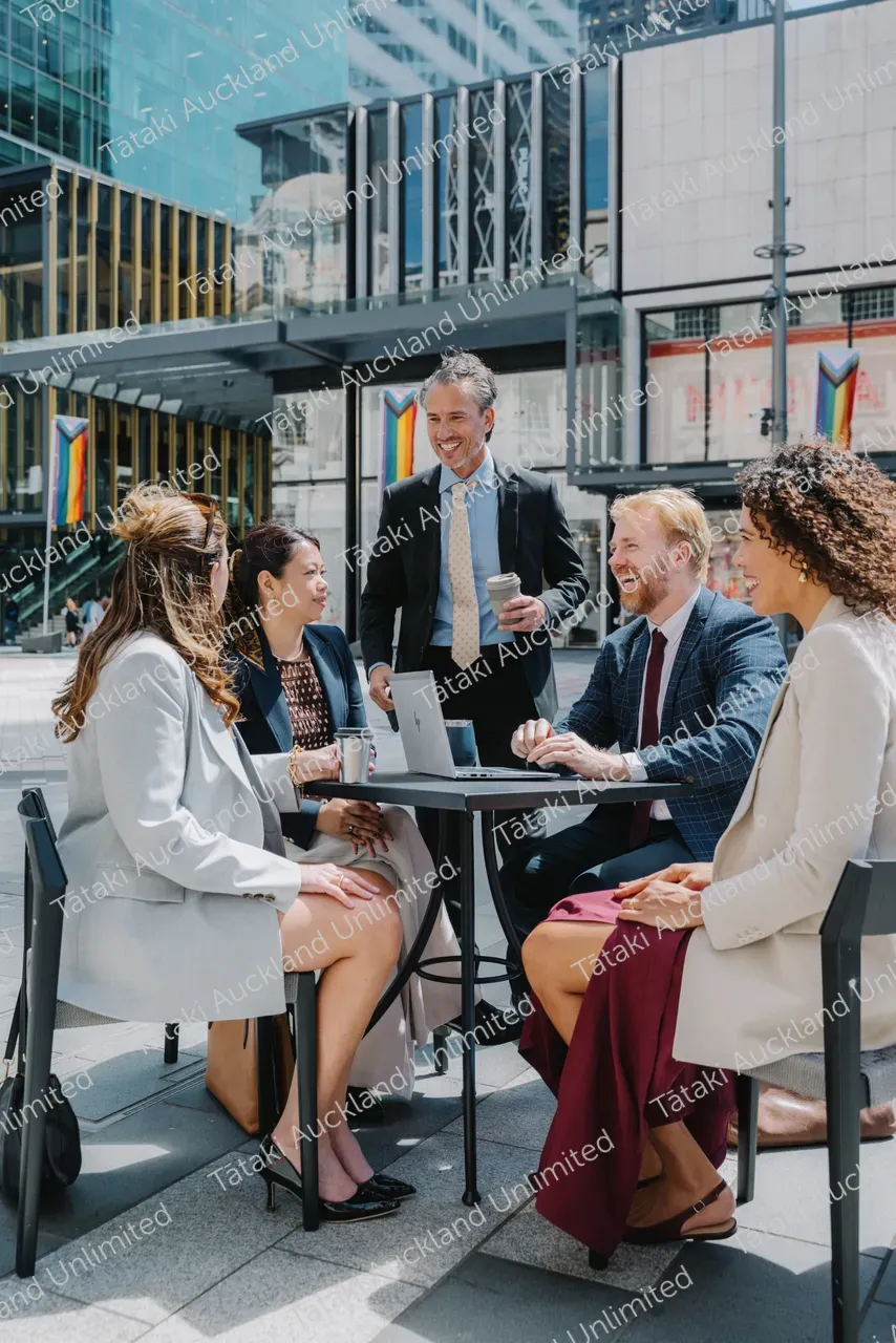 Outdoor business meeting with five professionals 5